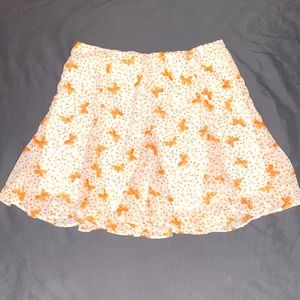 A short white skirt with butterfly print from Forever 21. Size 2.